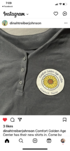 Screenshot of Instagram post of Comfort Golden Age Center shirts with logo